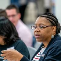 Attendees mingling prior to event start 23
